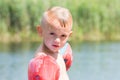 Little boy bathing on the lake Royalty Free Stock Photo