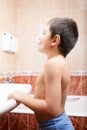 Little boy in bathroom Royalty Free Stock Photo