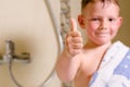 Little boy in the bathroom giving a thumbs up Royalty Free Stock Photo