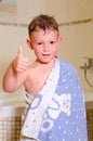 Little boy in the bathroom giving a thumbs up Royalty Free Stock Photo