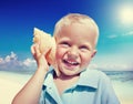Little Boy Beach Seashell Fun Vacation Concept Royalty Free Stock Photo