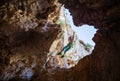 Little boy being lowered down while top rope climbing Royalty Free Stock Photo