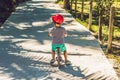 Little boy on a bicycle. Caught in motion, on a driveway motion blurred. Preschool child`s first day on the bike. The joy of move Royalty Free Stock Photo