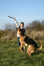 Little boy and big dog (German Shepherd ). Royalty Free Stock Photo