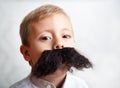 Boy with a big mustache Royalty Free Stock Photo