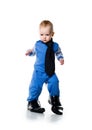 Little boy on the big shoes Royalty Free Stock Photo