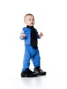 Little boy on the big shoes Royalty Free Stock Photo