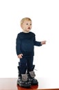 Little boy and big shoes Royalty Free Stock Photo