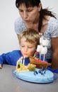 Little boy with birthday cake
