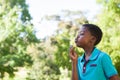 Little boy blowing bubbles in the park Royalty Free Stock Photo