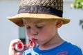 Little boy blows bubbles Royalty Free Stock Photo