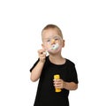 Little boy blows bubbles Royalty Free Stock Photo