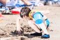 Little boy in blue sea Royalty Free Stock Photo