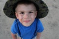 Little boy in blue t-shirt and hat