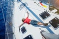 Little boy on board of sailing yacht on summer cruise. Travel adventure, yachting with child on family vacation. Royalty Free Stock Photo