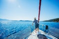 Little boy on board of sailing yacht on summer cruise. Travel adventure, yachting with child on family vacation. Royalty Free Stock Photo