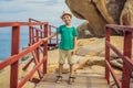 Little boy on boardwalk with stairs to the beach, vacation concept Royalty Free Stock Photo