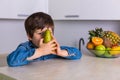 Little boy with a bowl of fresh fruits Royalty Free Stock Photo