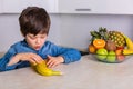 Little boy with a bowl of fresh fruits Royalty Free Stock Photo