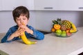 Little boy with a bowl of fresh fruits Royalty Free Stock Photo