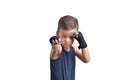 Little boy boxing, shows his fists, isolated on white Royalty Free Stock Photo