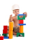 Little boy builds a house of toys Royalty Free Stock Photo