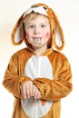 Little boy in bunny costume with painted teeth