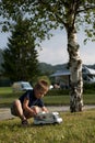 Little boy at camping site Royalty Free Stock Photo