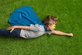 Little superhero flying over grass Royalty Free Stock Photo