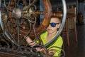 Little boy captain with steering wheel on ship Royalty Free Stock Photo