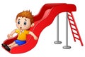Little boy cartoon playing on a slide