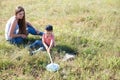 Little boy catches NET butterflies in the field for a walk Royalty Free Stock Photo