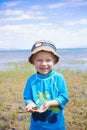 Little Boy catching Frogs at the Lake Royalty Free Stock Photo