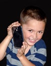 Little boy with cell phone Royalty Free Stock Photo