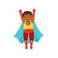 Little boy character dressed as a super hero standing with his hands raised cartoon vector Illustration Royalty Free Stock Photo