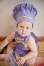 Little boy in a chief hat cooking Royalty Free Stock Photo