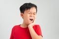 Little boy child have toothache, toothache emotions large inflated cheek emotion background