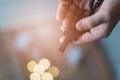 Little boy child praying and holding wooden rosary. Royalty Free Stock Photo