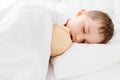 Little boy child sleeping in bed Royalty Free Stock Photo