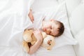 Little boy child sleeping in bed Royalty Free Stock Photo