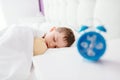 Little boy child sleeping in bed. Hugging his favourite teddy bear Royalty Free Stock Photo