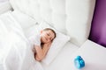 Little boy child sleeping in bed. Hugging his favourite teddy bear Royalty Free Stock Photo