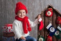 Little boy on christmas, opening presents Royalty Free Stock Photo