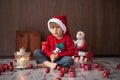 Little boy on christmas, opening presents Royalty Free Stock Photo