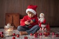 Little boy on christmas, opening presents Royalty Free Stock Photo