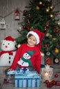 Little boy on christmas, opening presents Royalty Free Stock Photo