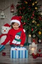 Little boy on christmas, opening presents Royalty Free Stock Photo