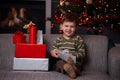 Little boy with christmas presents Royalty Free Stock Photo