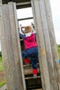 Little boy climbing a ladder Royalty Free Stock Photo