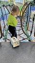 Little Boy Climbing The Net At Indoor Playground Royalty Free Stock Photo